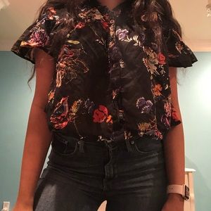 Free People black crop top w/ floral pattern